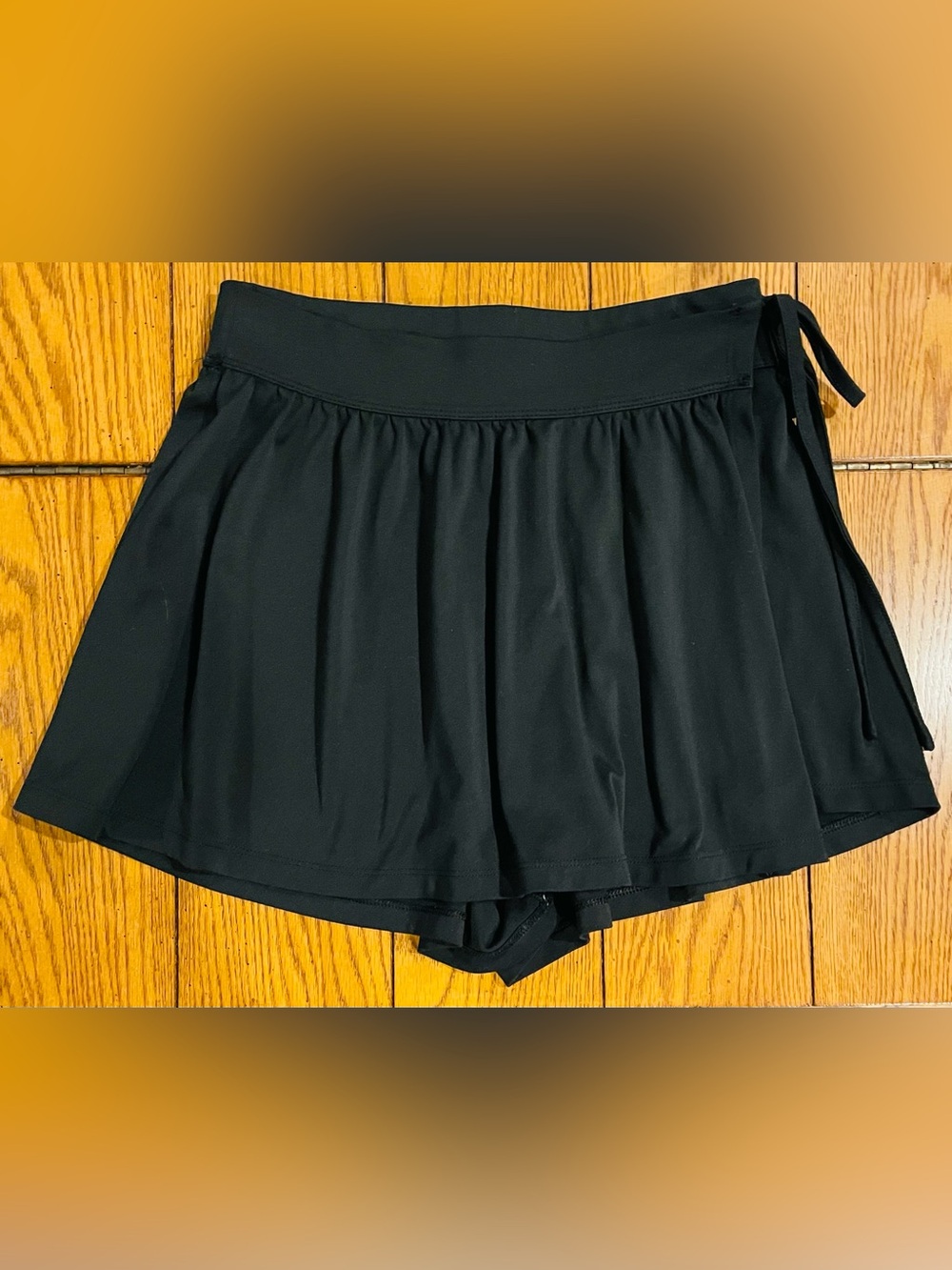 Madewell Flex Wrap Skort, medium, black, built in shorts, tie wrap closure